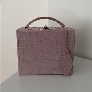 Pink box bag with removable shoulder straps